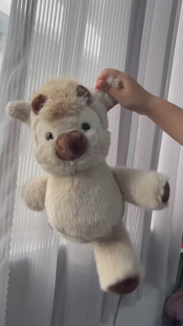 Video of the running cow plush swinging its legs when shaken